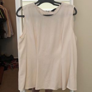 Sleeveless High Neck Peplum Blouse